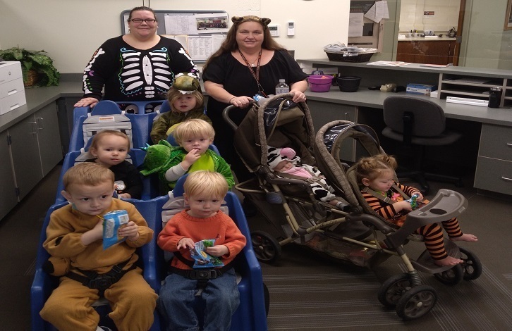 Daycare kids stopping by the central office trick or treating
