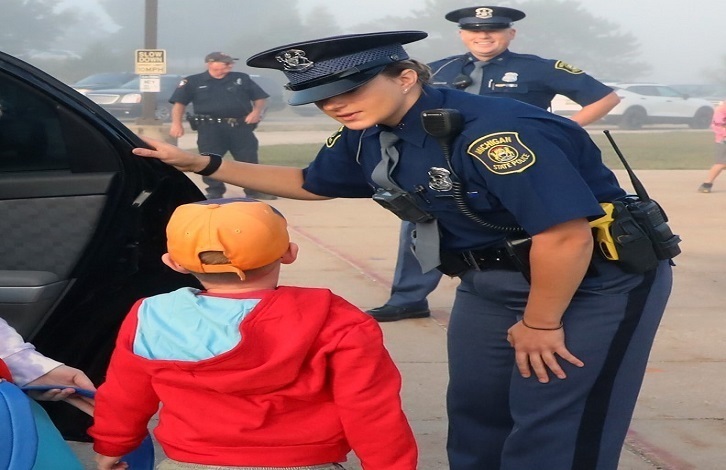 Police greeting elementary students